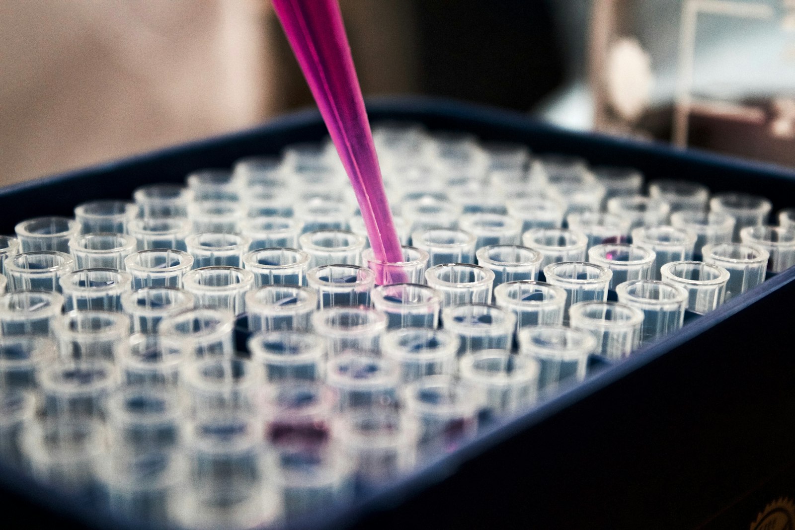 Scientific laboratory research bench with biochemical analysis glassware and digital blood ethanol data